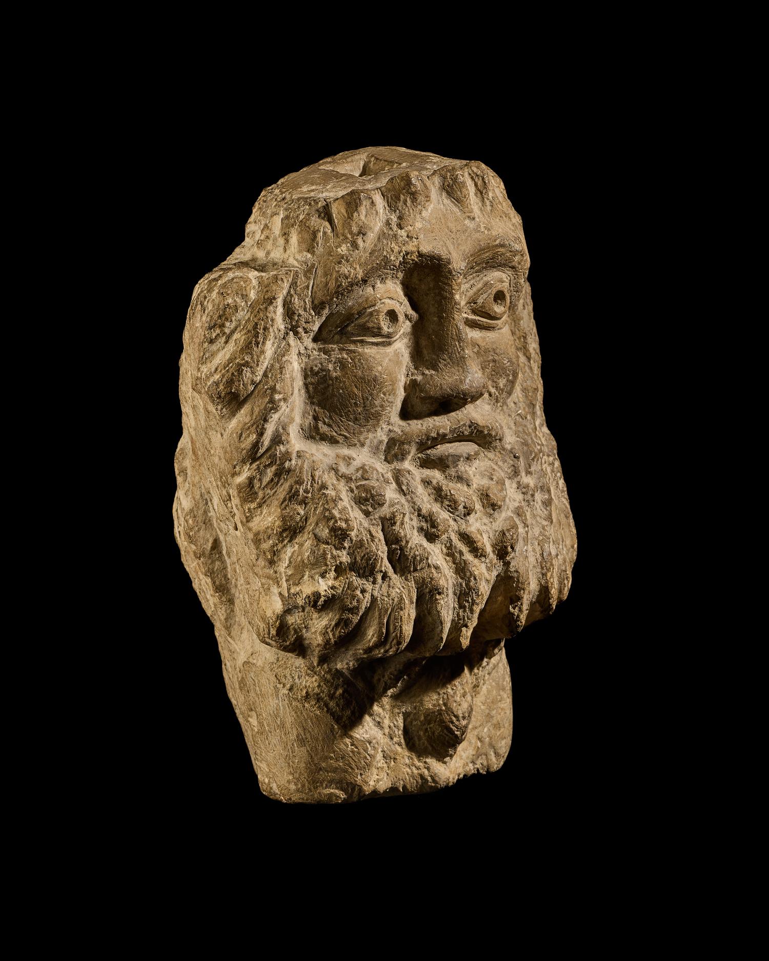 A Coptic Limestone Bust of Zeus