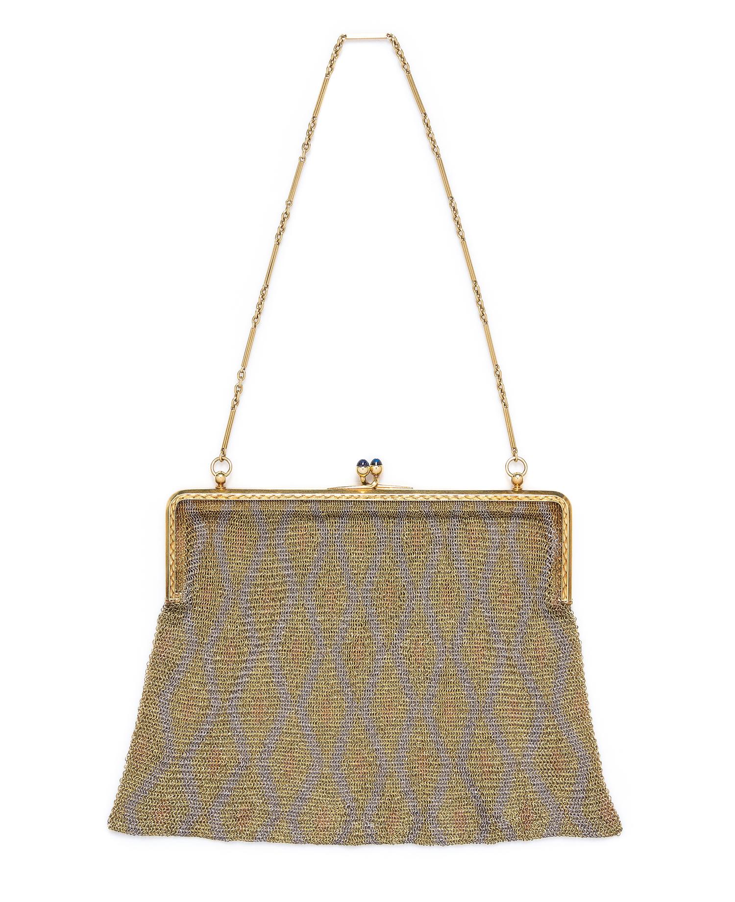 An 18 Karat Gold, Platinum and Sapphire Mesh Purse, 143.75 dwts.