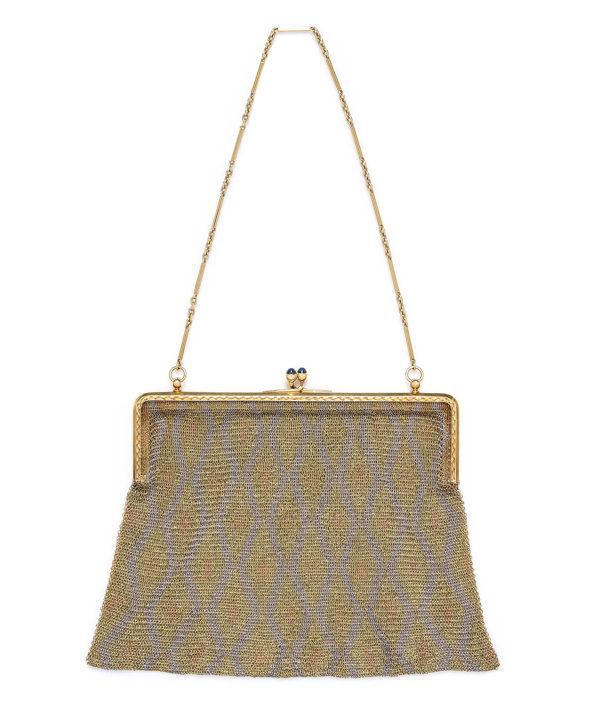 An 18 Karat Gold, Platinum and Sapphire Mesh Purse, 143.75 dwts.