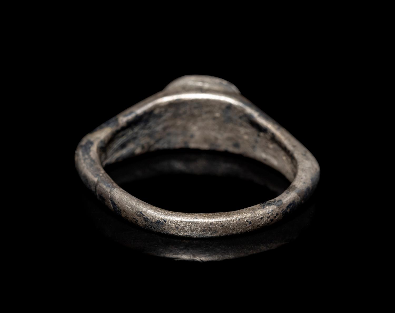 A Roman Silver Finger Ring with a Portrait Bust of a Woman