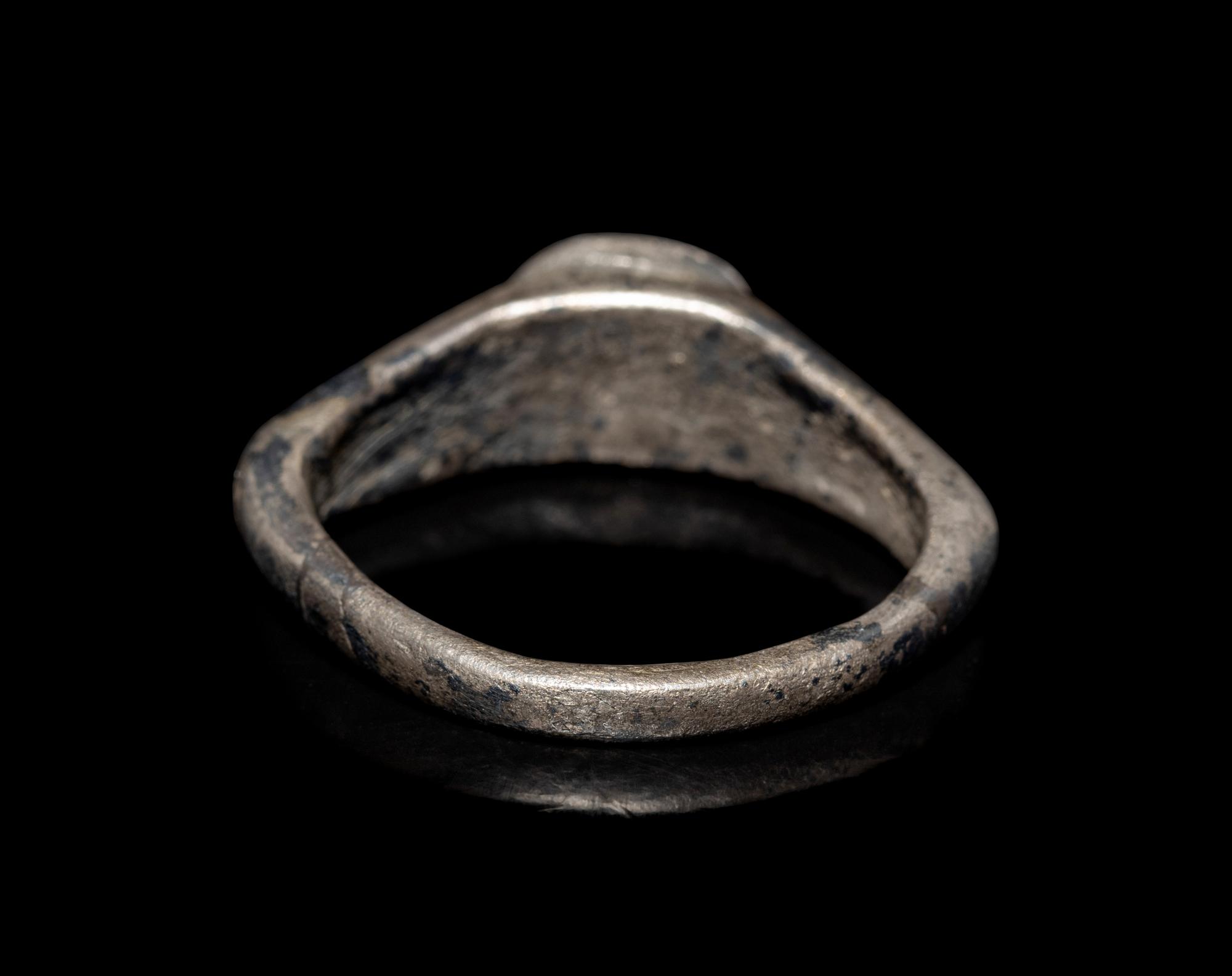 A Roman Silver Finger Ring with a Portrait Bust of a Woman