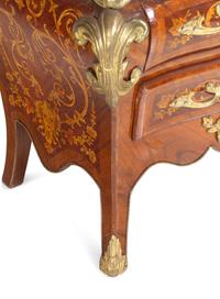 A Near Pair of Régence Style Gilt Metal Mounted Inlaid Kingwood Marble-Top Bombe Commodes