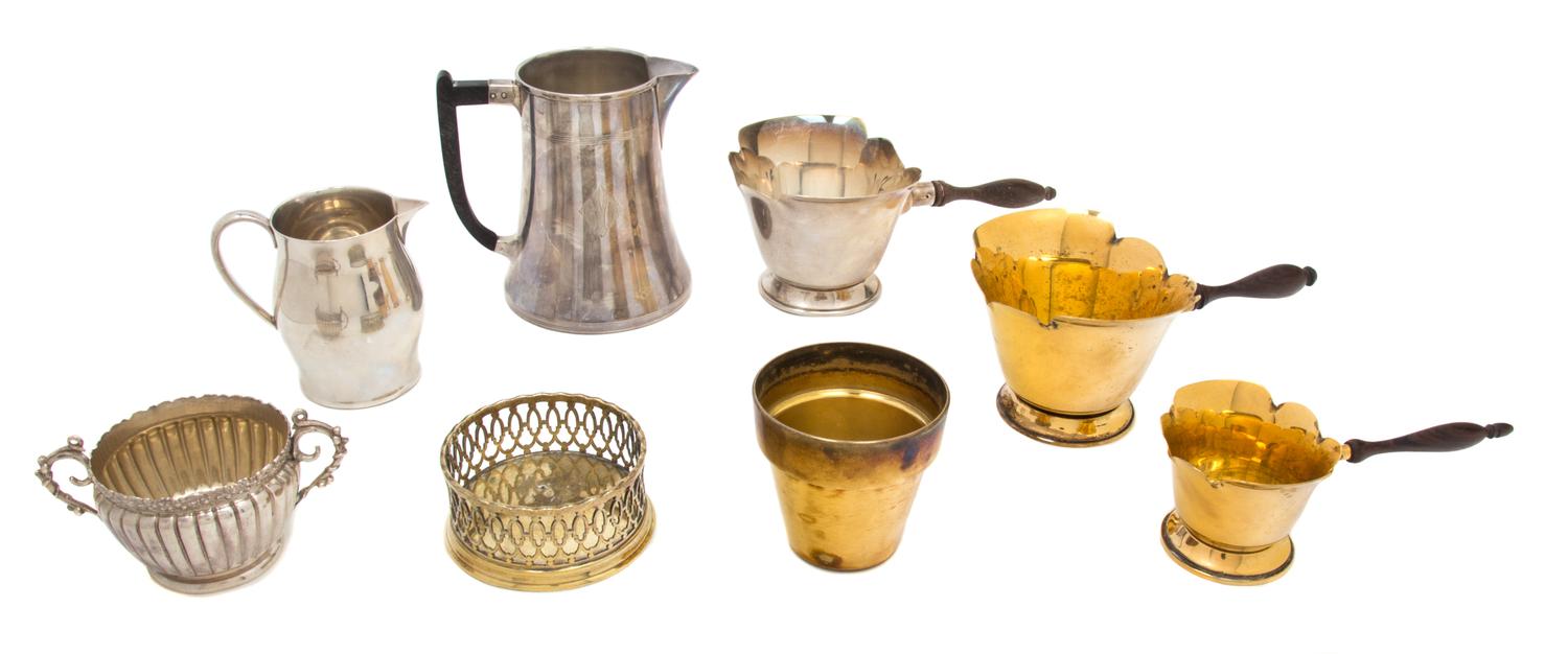 A Group of American Silver Articles, Various makers, comprising: a Tiffany & Co. silver gilt beaker 3 Cartier silver gilt sauce pourers