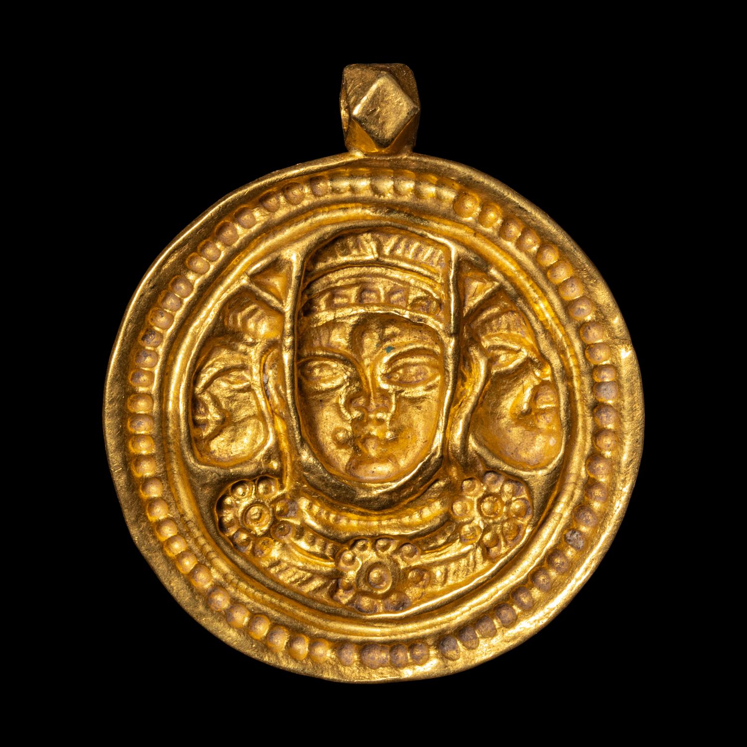 A Eurasian Gold Pendant