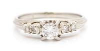 An 18 Karat White Gold and Diamond Ring, 1.70 dwts.