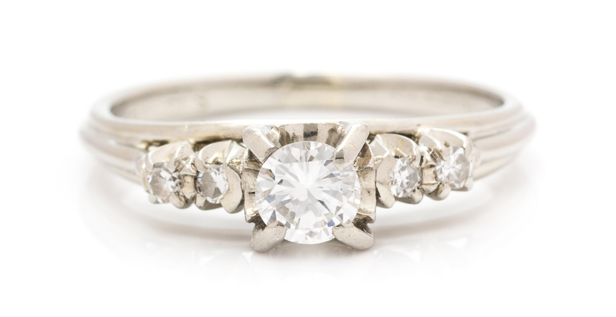 An 18 Karat White Gold and Diamond Ring, 1.70 dwts.