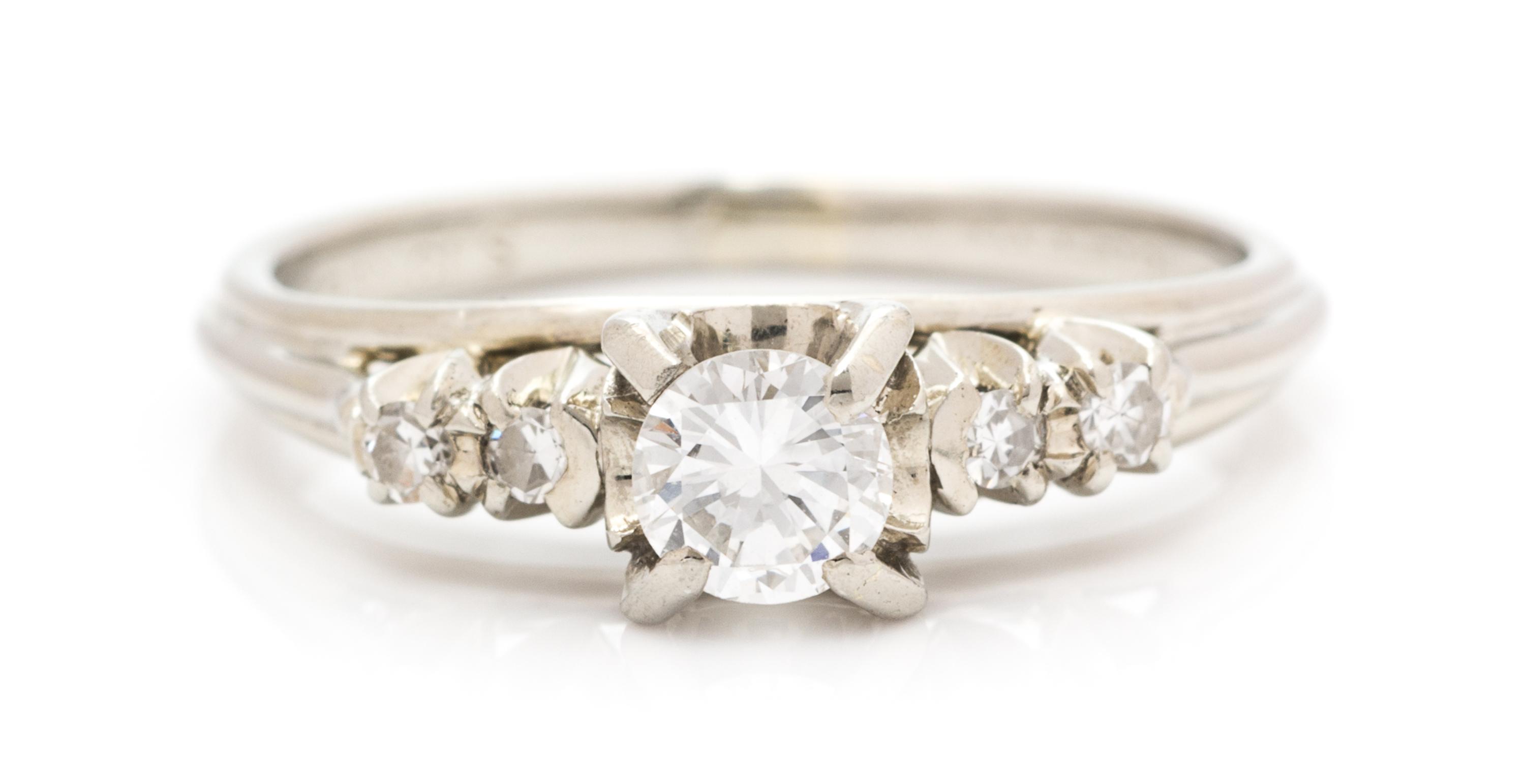 An 18 Karat White Gold and Diamond Ring, 1.70 dwts.