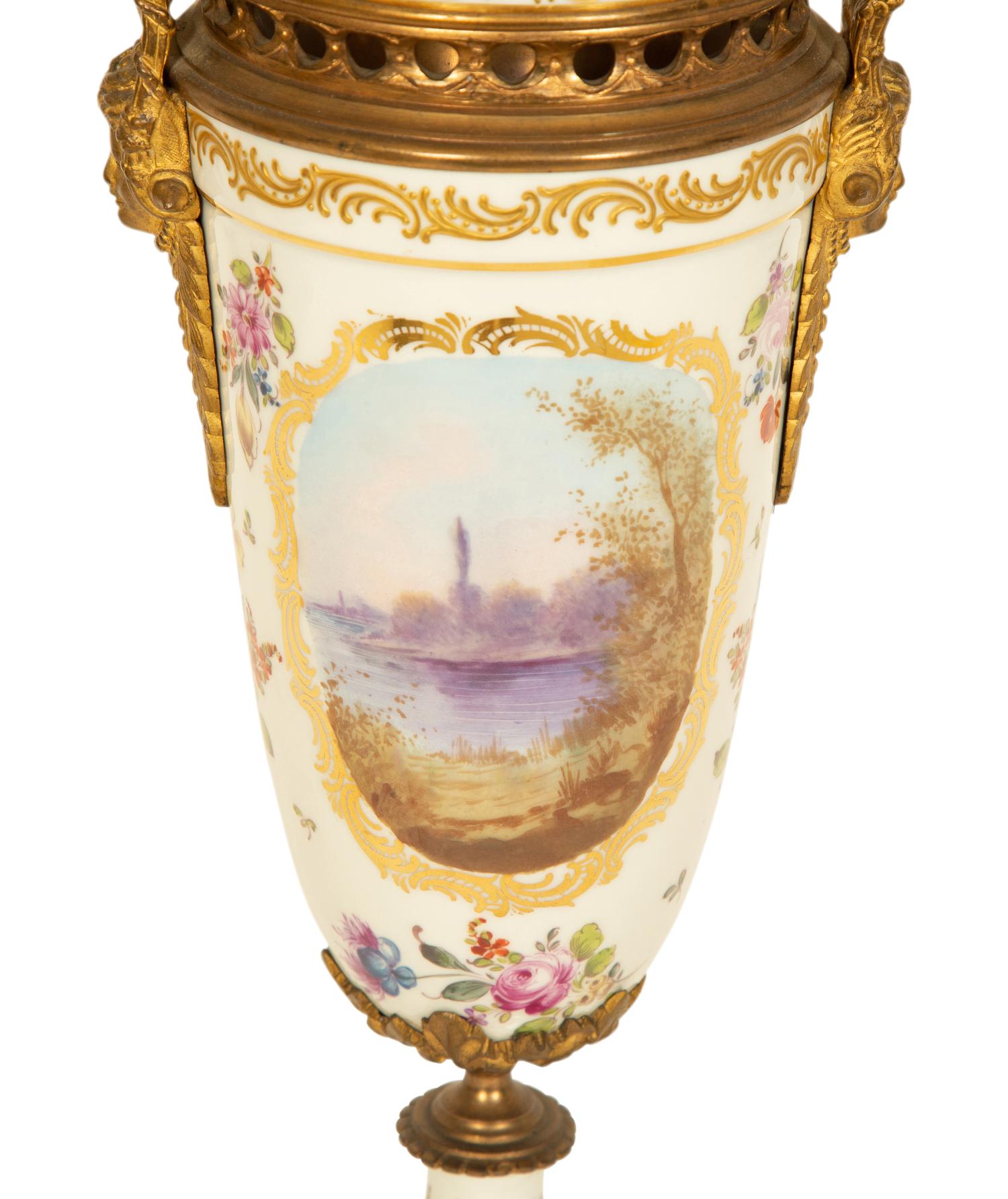 A Sevres Style Gilt Metal Mounted Porcelain Urn