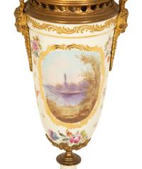 A Sevres Style Gilt Metal Mounted Porcelain Urn