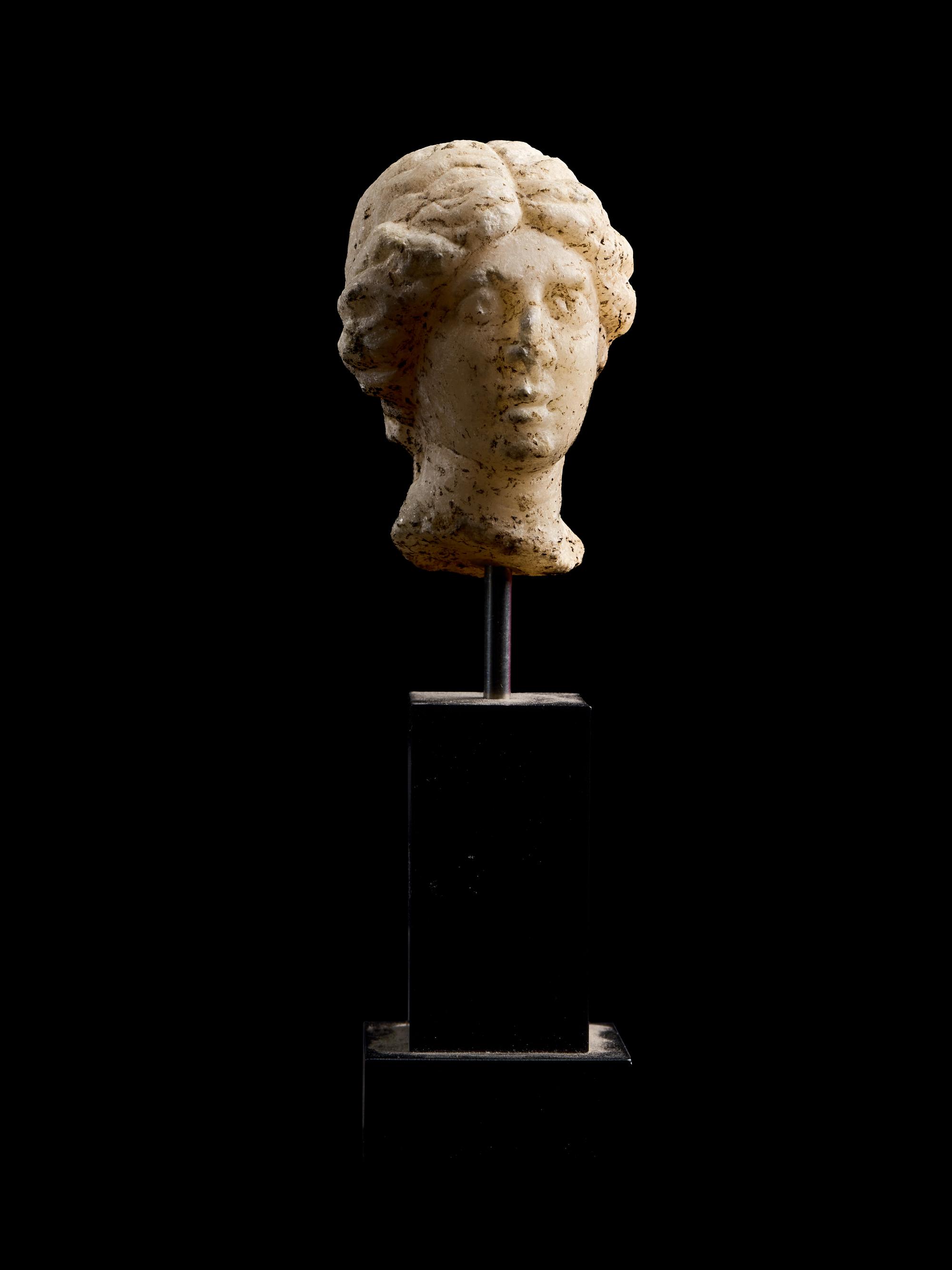 A Roman Marble Head of a Woman