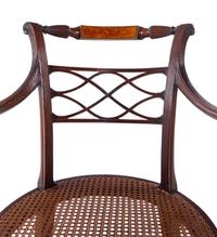 A Pair of George III Carved Mahogany Armchairs