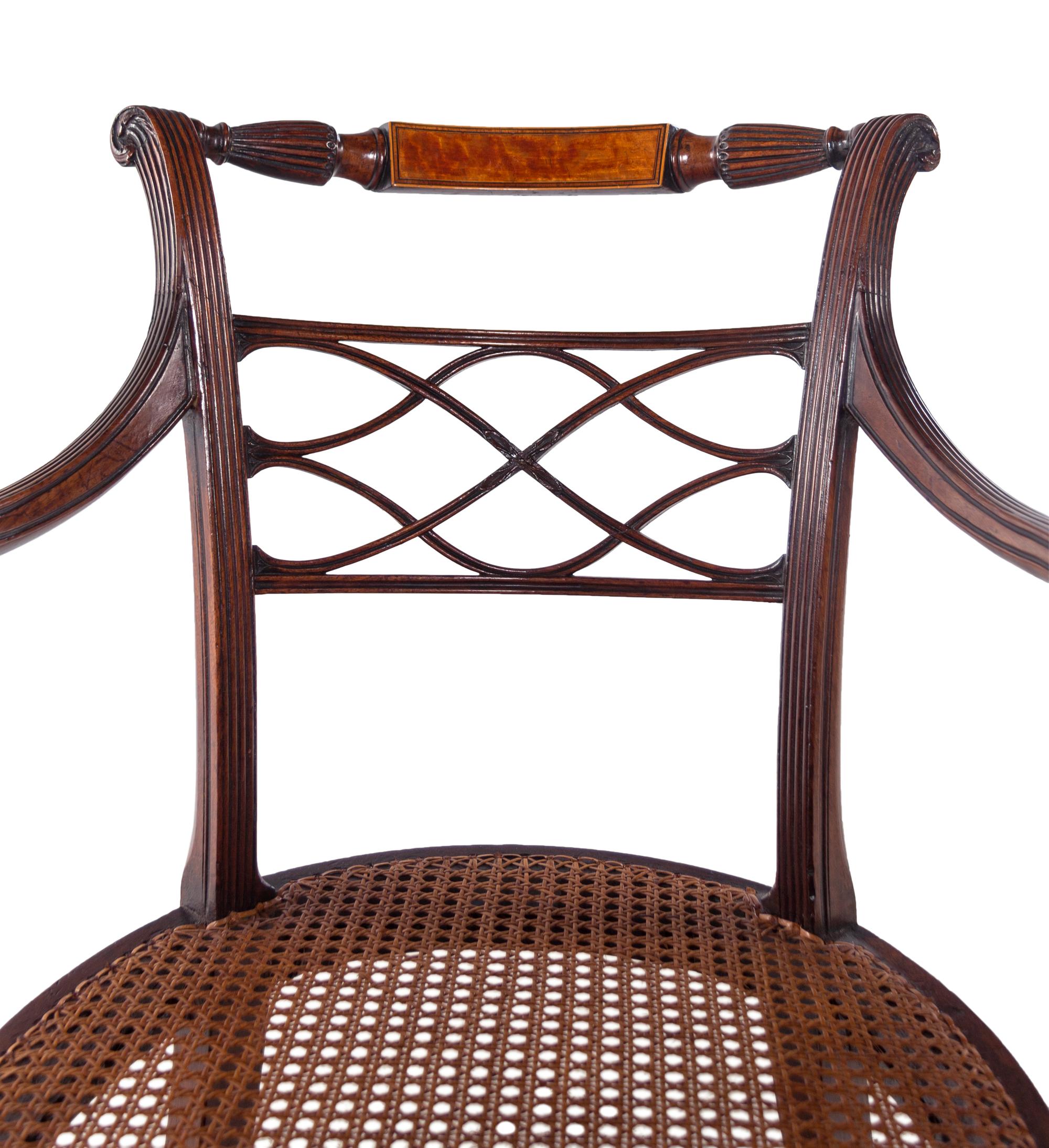 A Pair of George III Carved Mahogany Armchairs