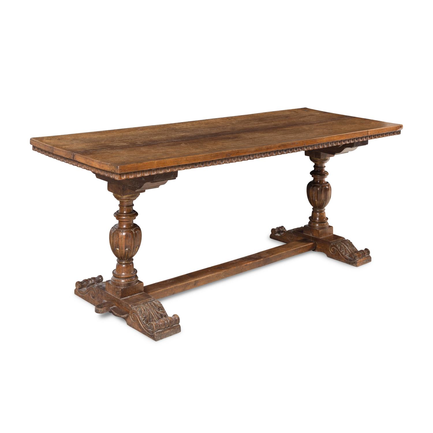 A Continental Parcel-Gilt Walnut Refectory Table