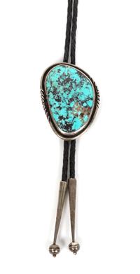 A Navajo Silver and Turquoise Bolo, Grace and Gilo Nakai Height 2 1/2 x width 1 3/4 inches.