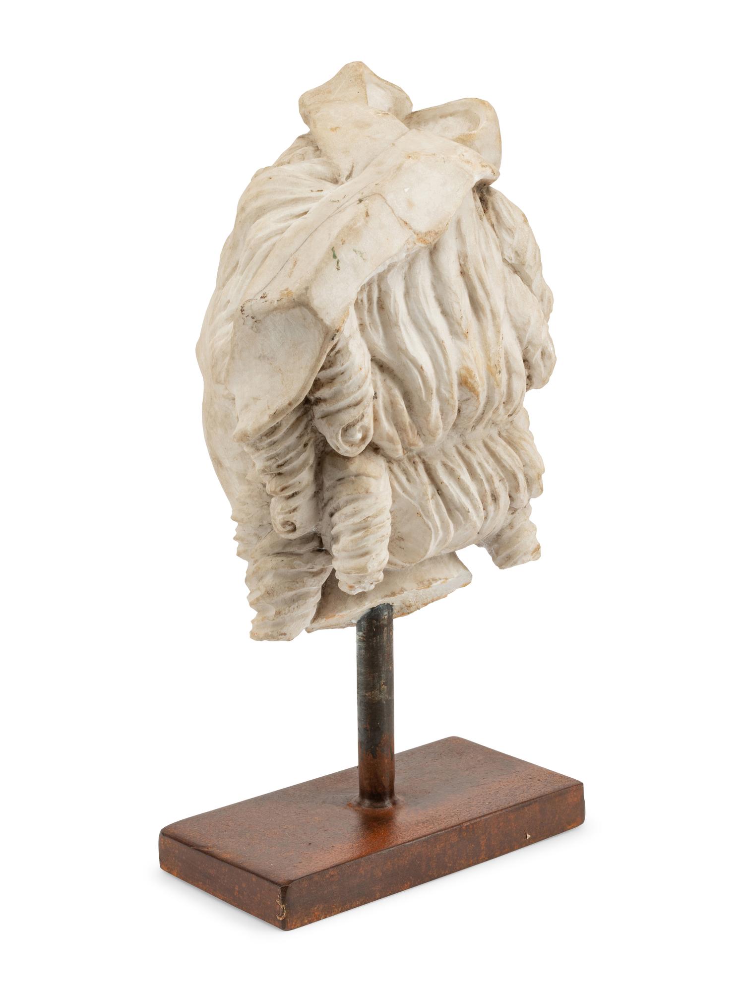 An Italian Marble Head of a Lady on an Iron Base