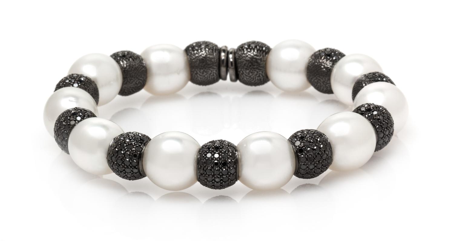 A Black Rhodium 18 Karat White Gold, Cultured South Sea Pearl and Black Diamond Flexible Cuff Bracelet, 37.50 dwts.