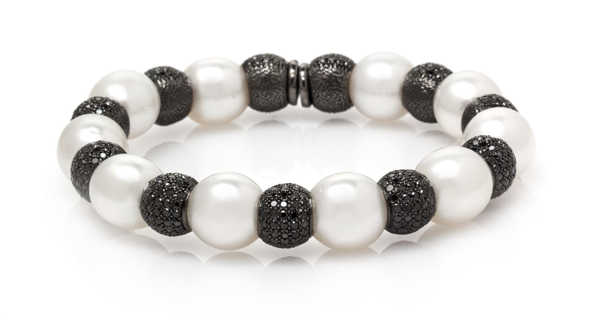 A Black Rhodium 18 Karat White Gold, Cultured South Sea Pearl and Black Diamond Flexible Cuff Bracelet, 37.50 dwts.