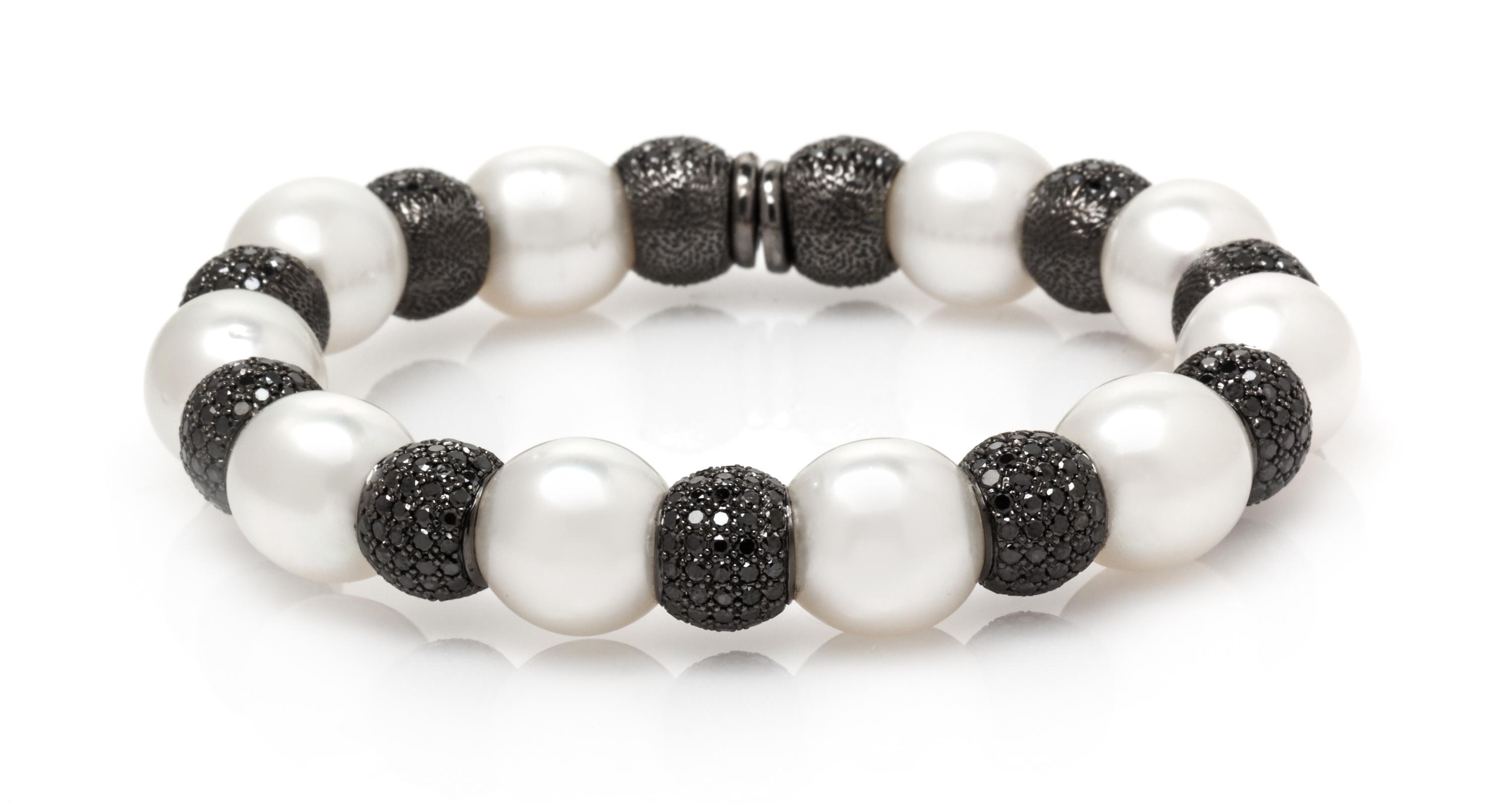 A Black Rhodium 18 Karat White Gold, Cultured South Sea Pearl and Black Diamond Flexible Cuff Bracelet, 37.50 dwts.