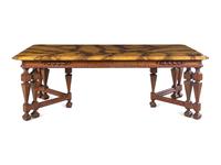 A Renaissance Revival Style Carved Walnut Faux Marble-Top Dining Table