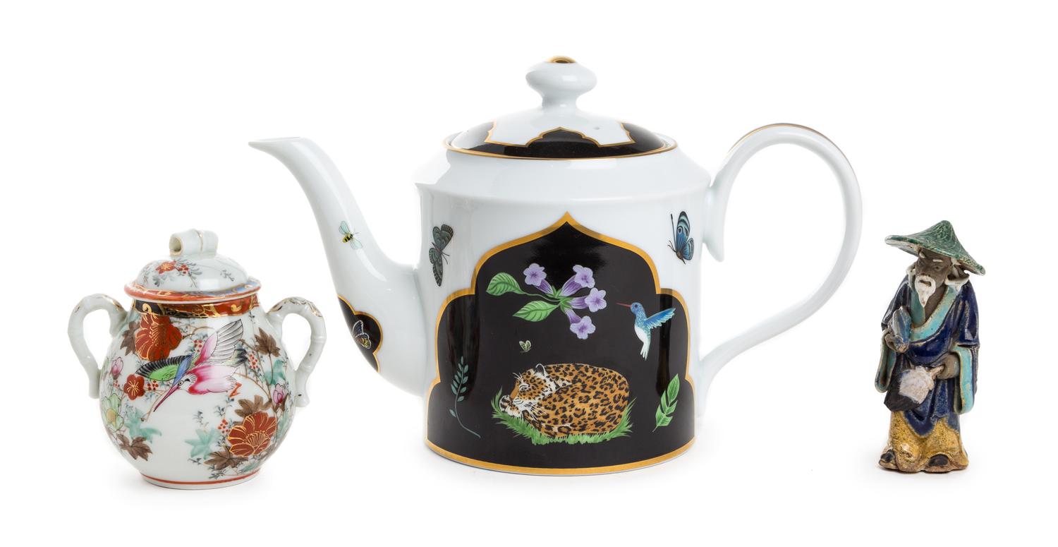 A Group of Three Porcelain and Ceramic Articles Height of teapot 7 1/8 inches.