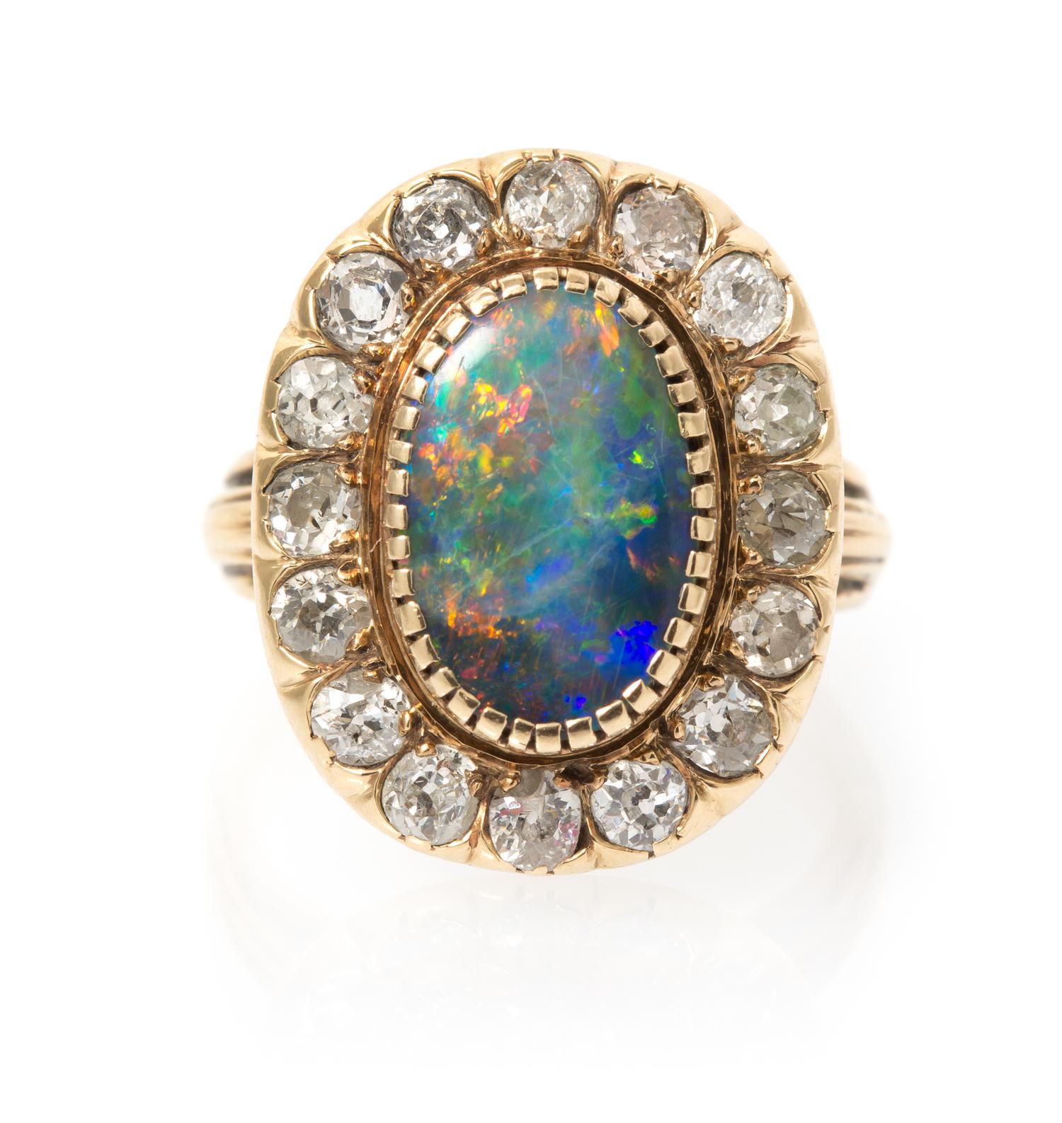 A Yellow Gold, Black Opal and Diamond Ring, 3.10 dwts.