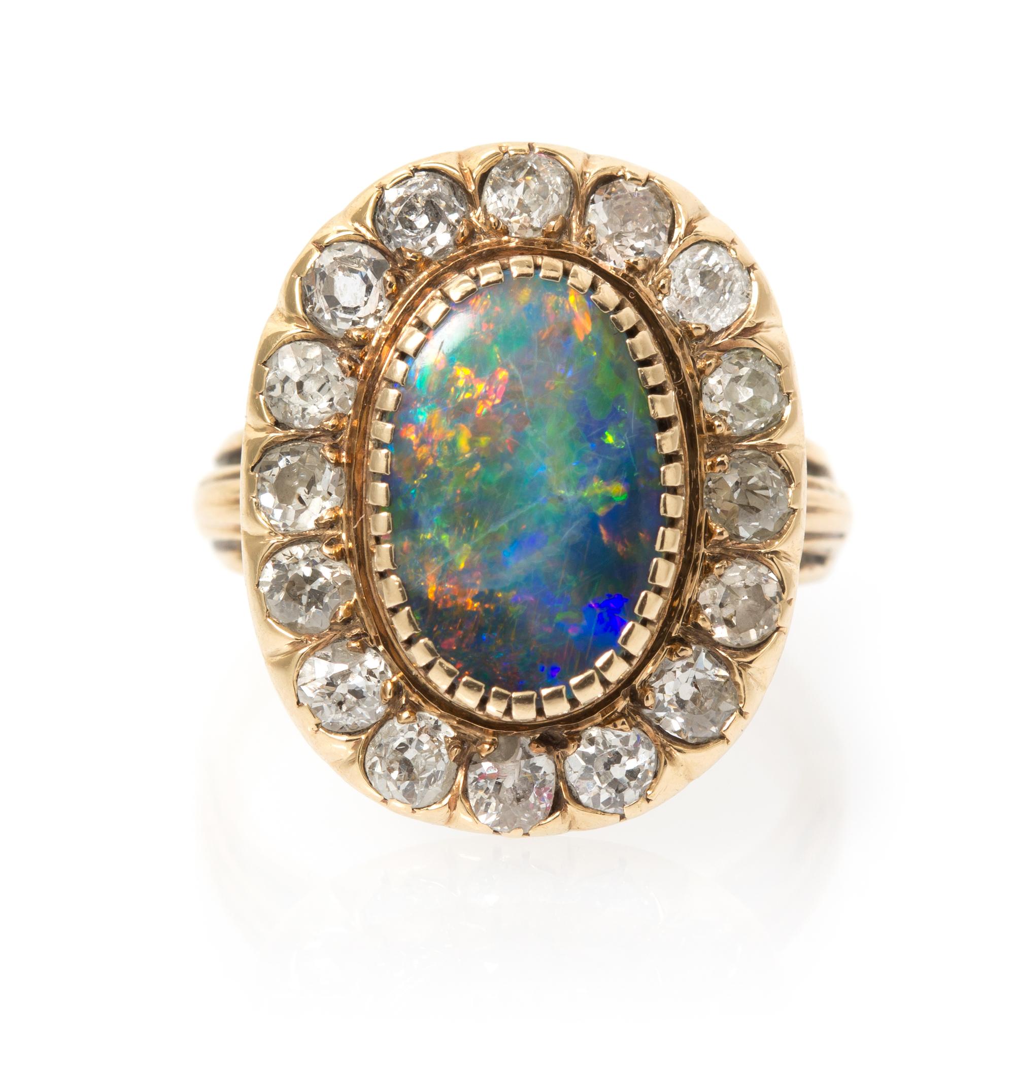 A Yellow Gold, Black Opal and Diamond Ring, 3.10 dwts.