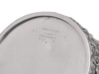 A Tiffany & Co. Repousse Dresser Jar and Associated Sterling Silver Undertray