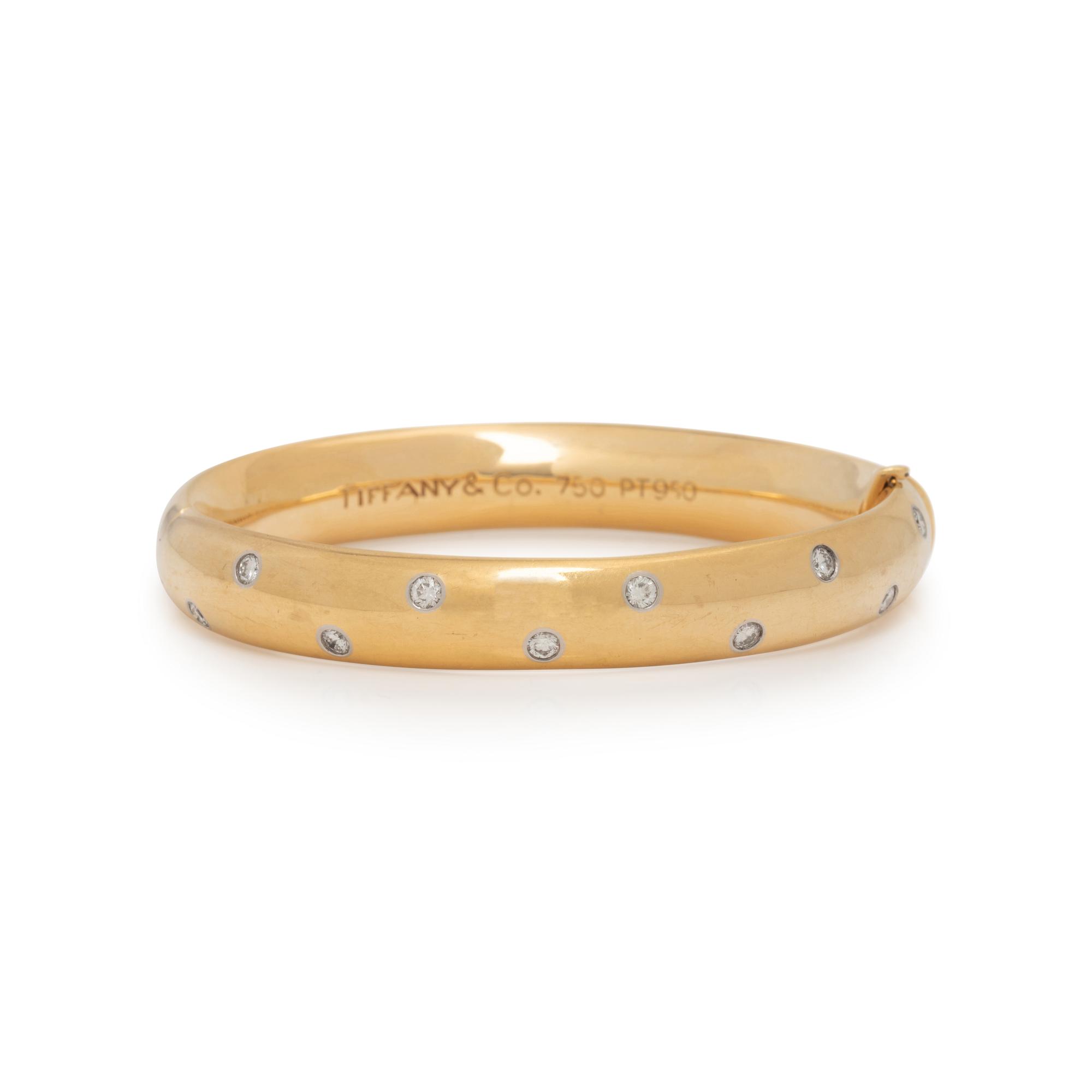 TIFFANY & CO., YELLOW GOLD AND DIAMOND 'ETOILE' BANGLE BRACELET