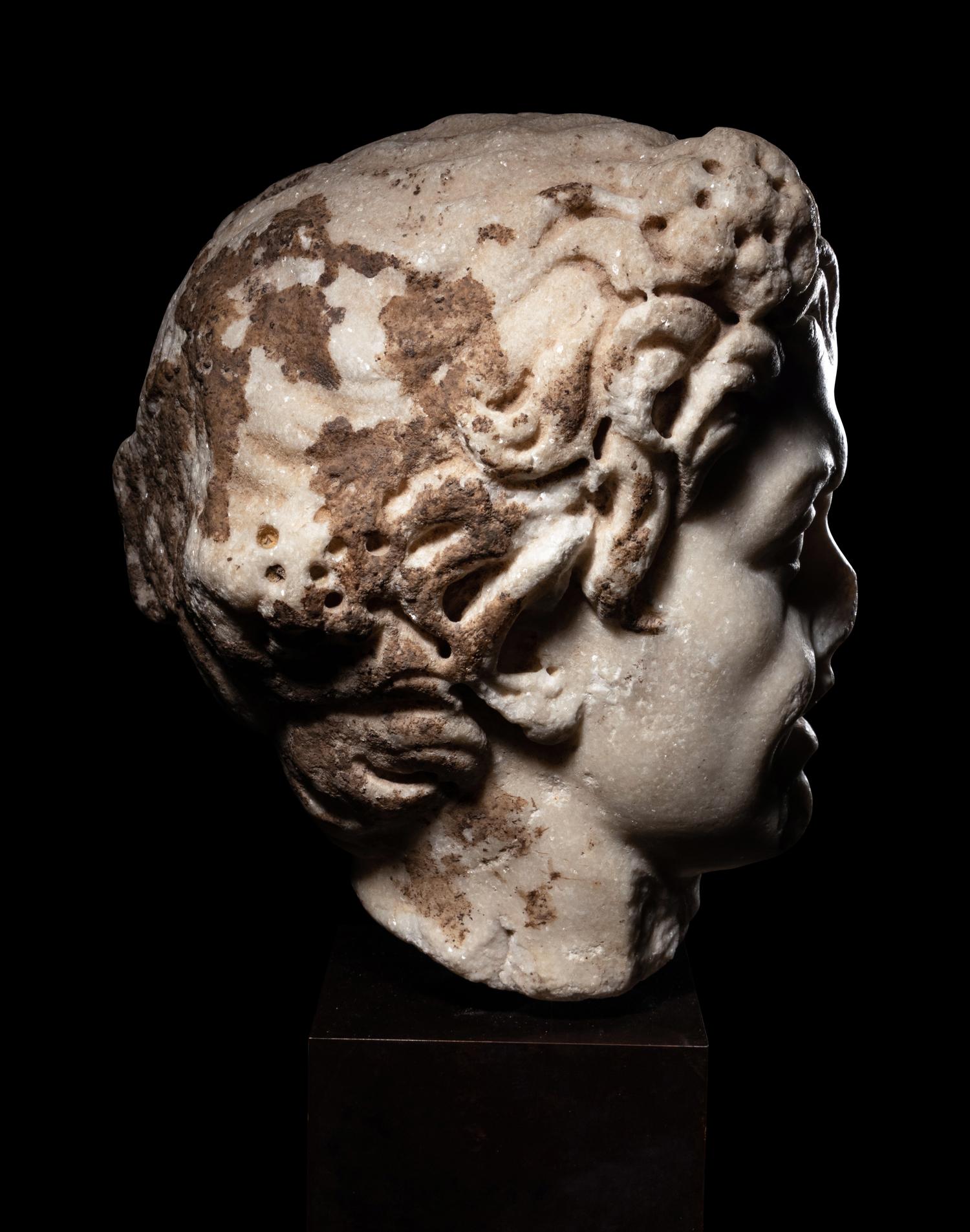 A Roman Marble Satyr Head