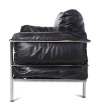 A Pair of Leather Upholstered Chrome Lounge Chairs in the Style of Le Corbusier