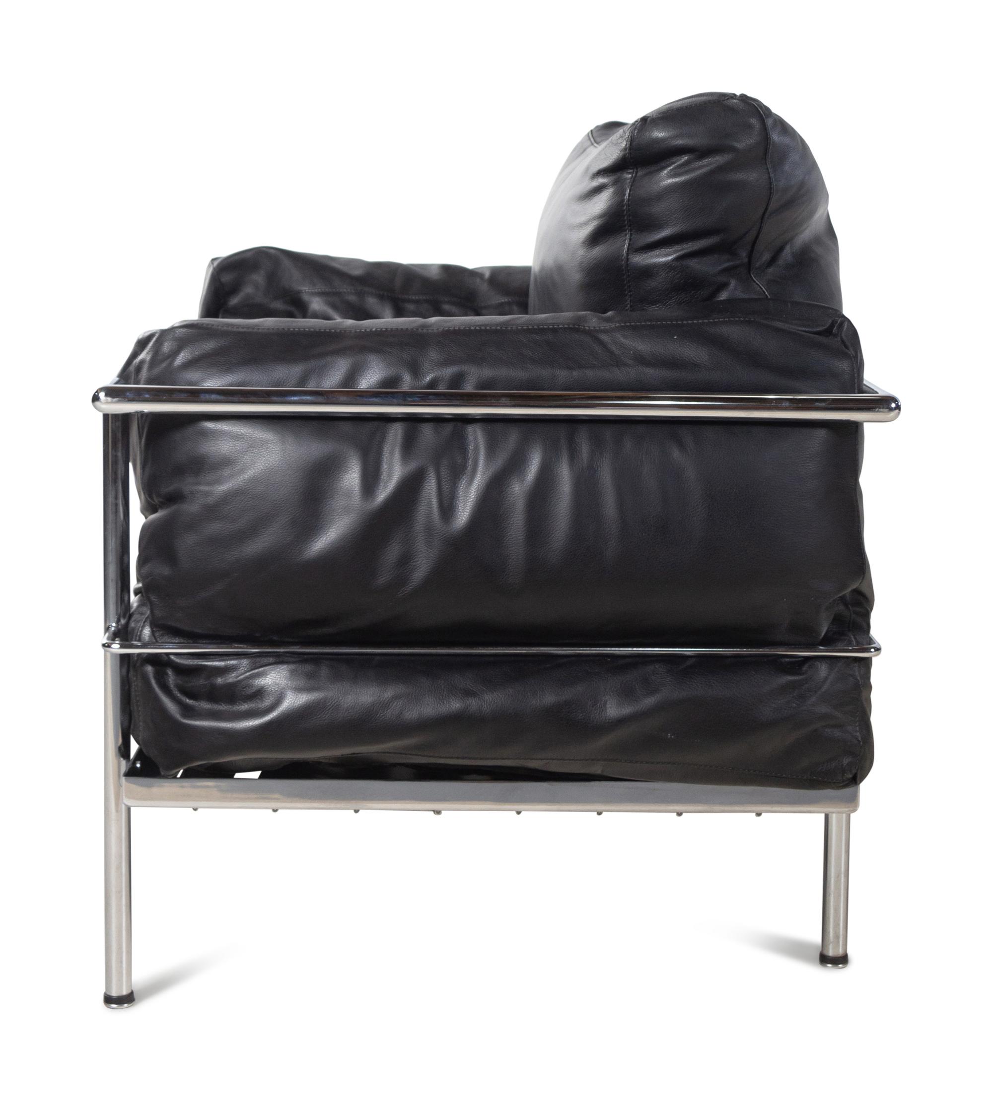 A Pair of Leather Upholstered Chrome Lounge Chairs in the Style of Le Corbusier
