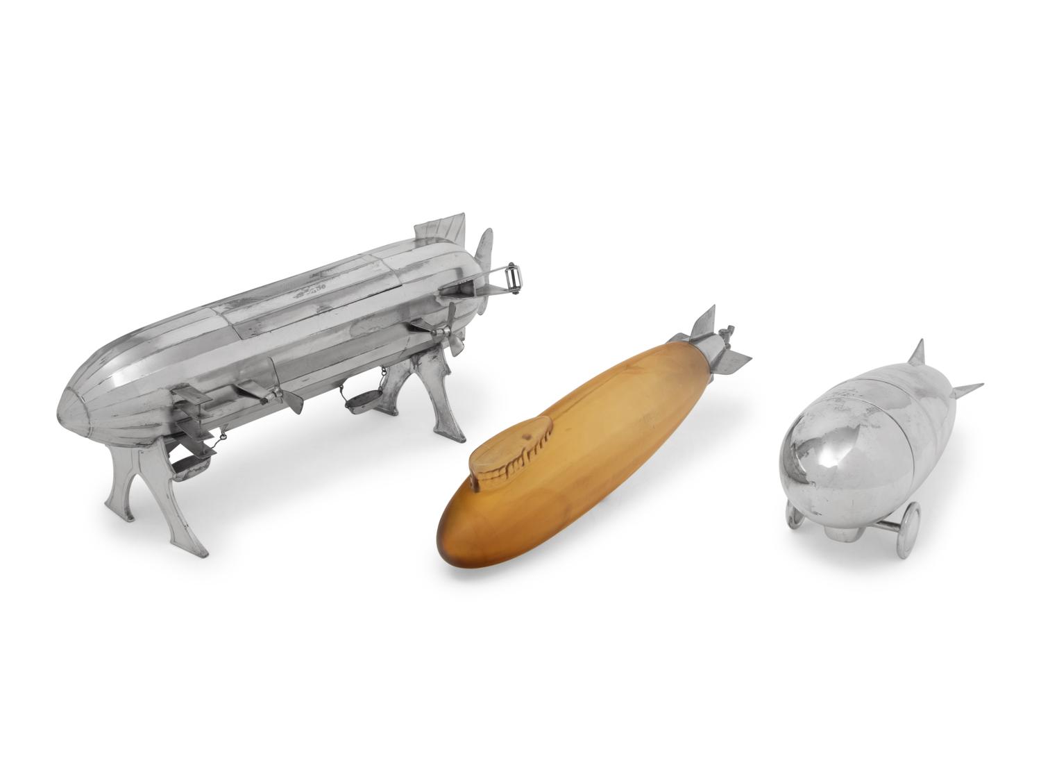 A Group of Three Blimp-Form Table Articles
