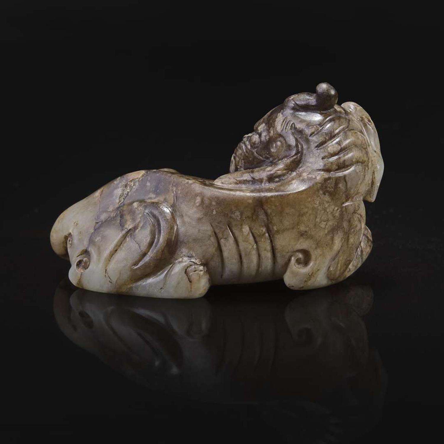 A Chinese brown and beige jade carving of a Baku 玉雕貘 Ming dynasty or earlier ????