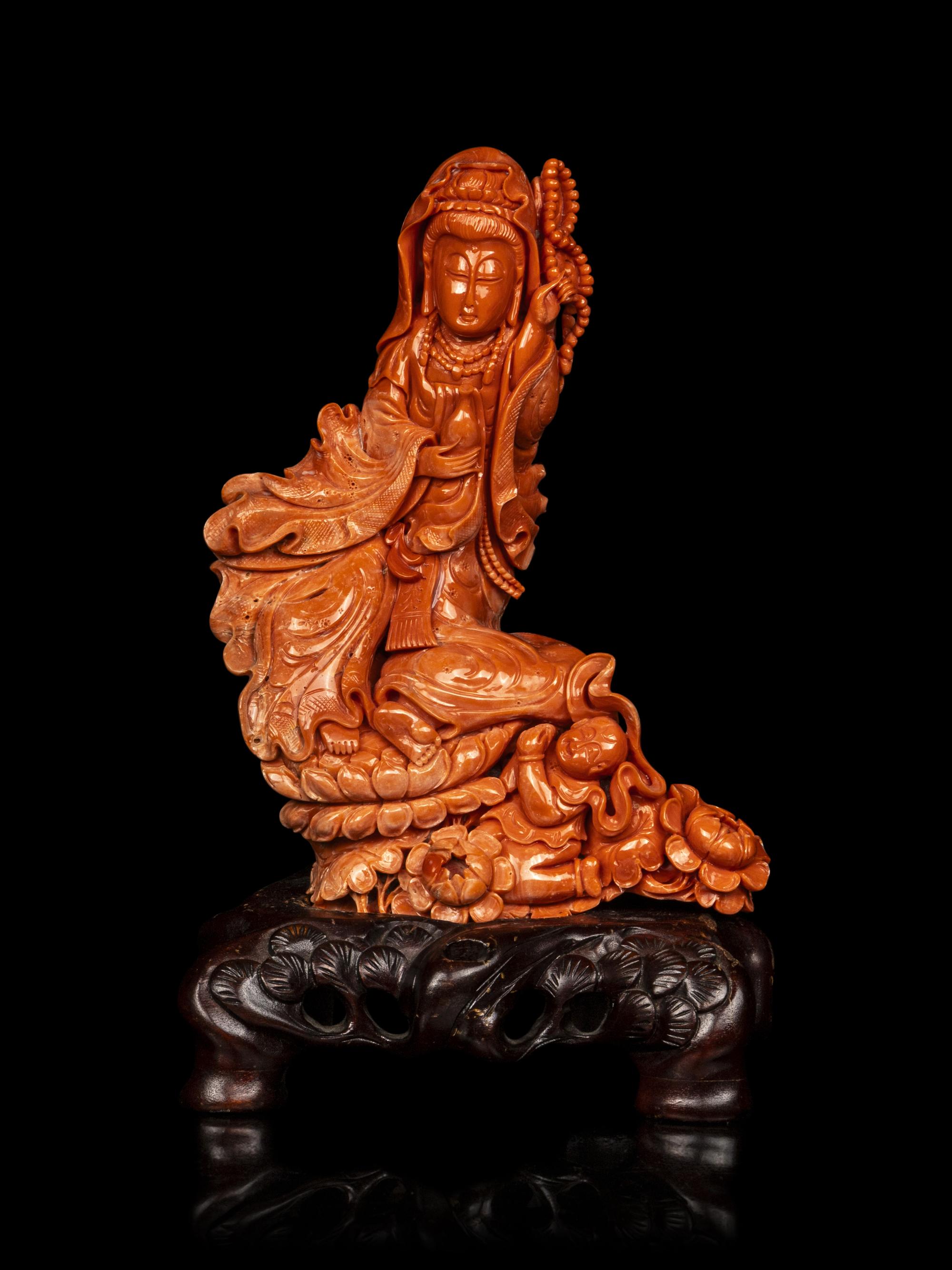 A Chinese Red Coral Carving of Guanyin