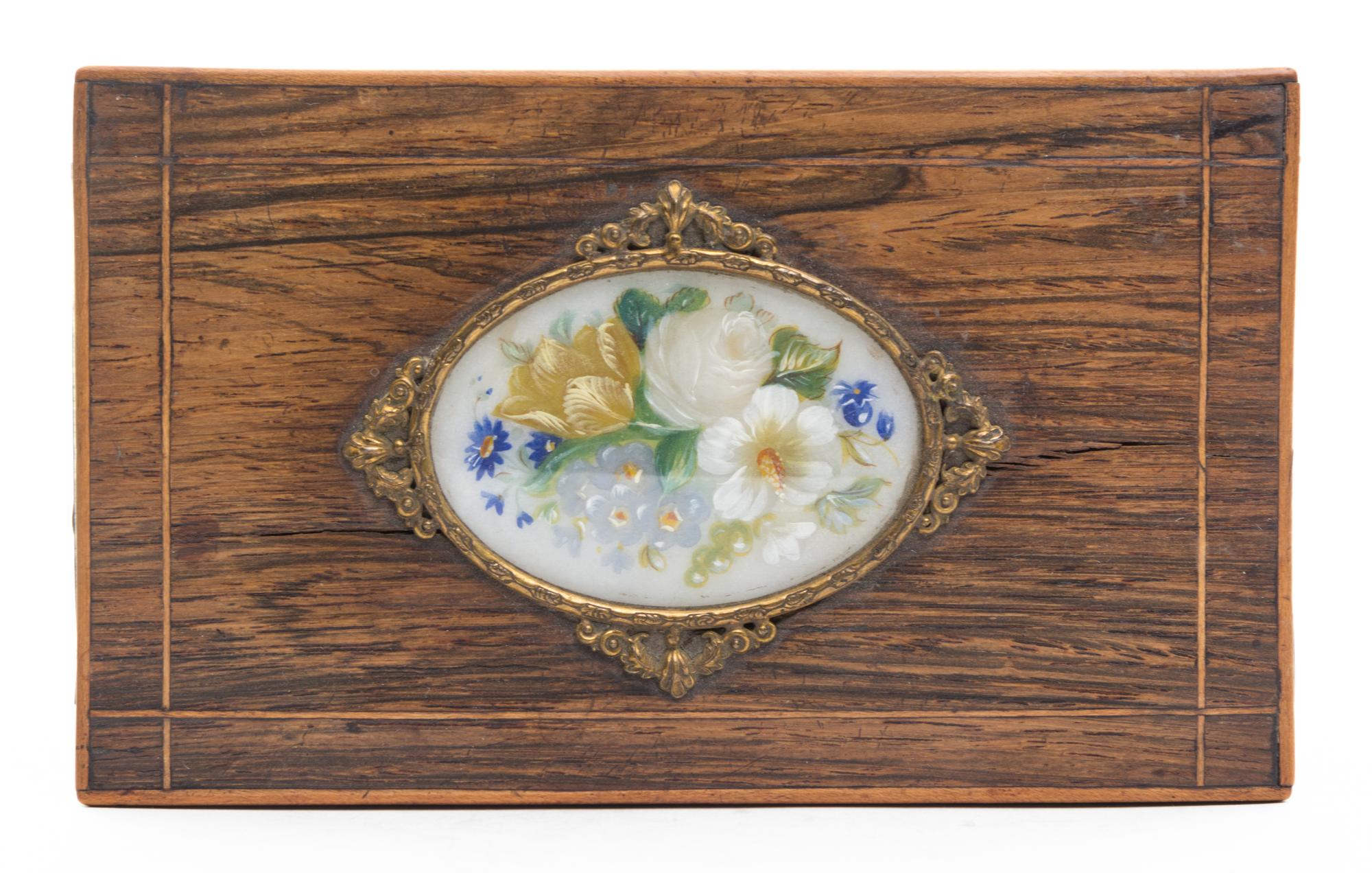 A Continental Tea Caddy Height 4 3/8 x width 6 1/2 x depth 4 inches.