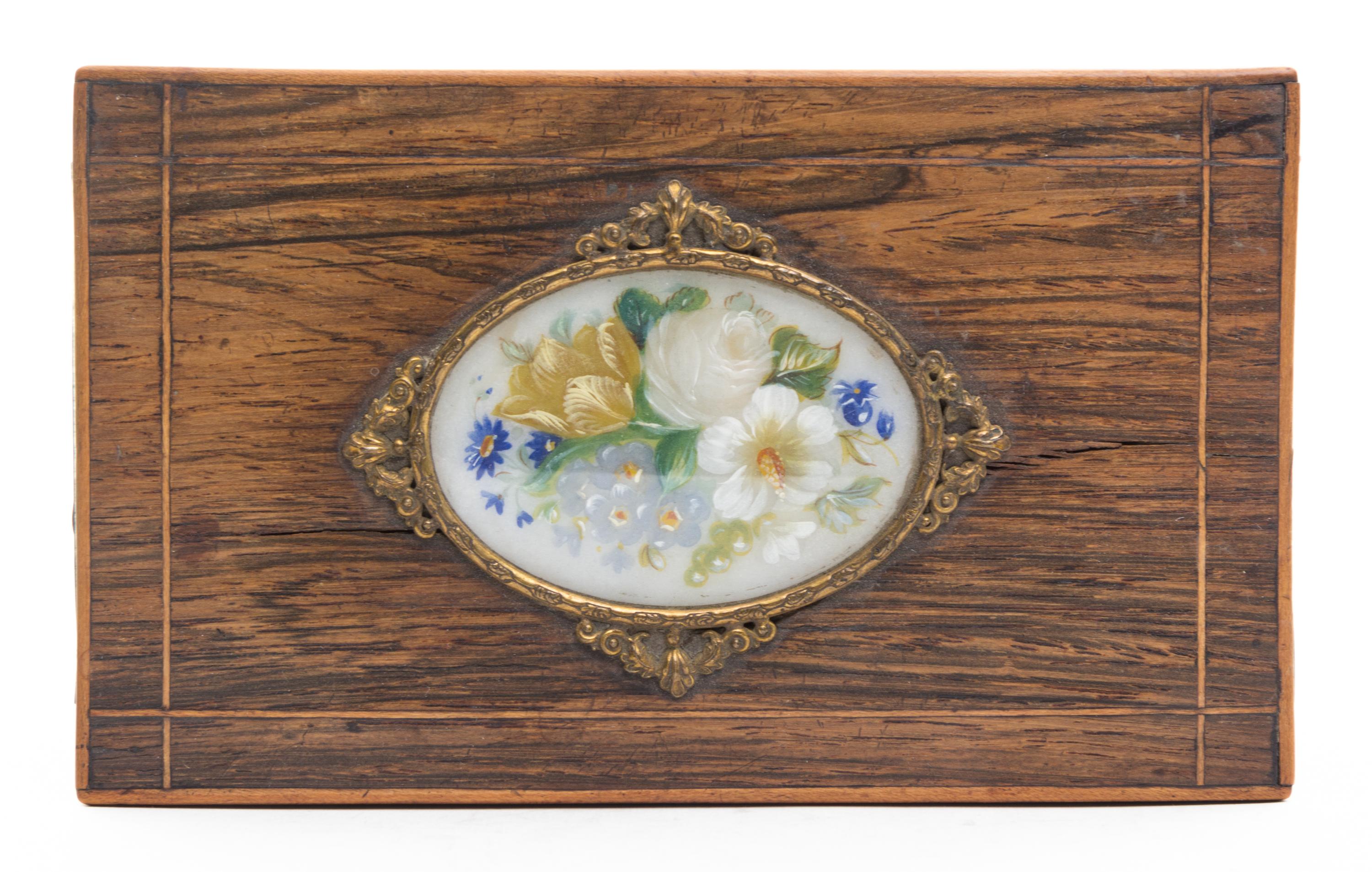 A Continental Tea Caddy Height 4 3/8 x width 6 1/2 x depth 4 inches.