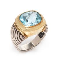 A Sterling Silver, 14 Karat Yellow Gold and Blue Topaz Ring, David Yurman, 8.85 dwts.