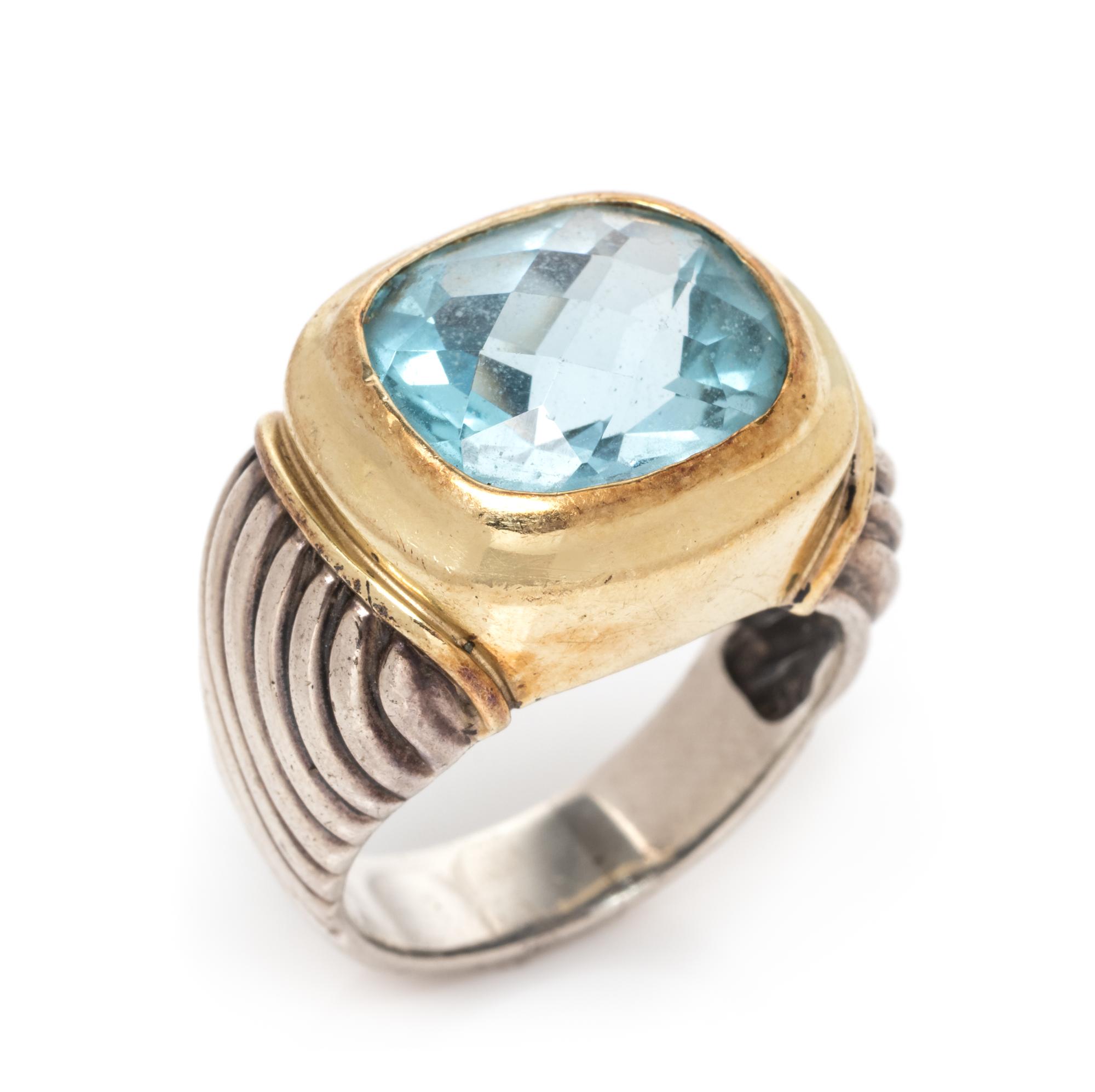 A Sterling Silver, 14 Karat Yellow Gold and Blue Topaz Ring, David Yurman, 8.85 dwts.
