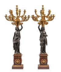 A Large French Gilt and Patinated Bronze and Rouge Marble Three-Piece Clock Garniture