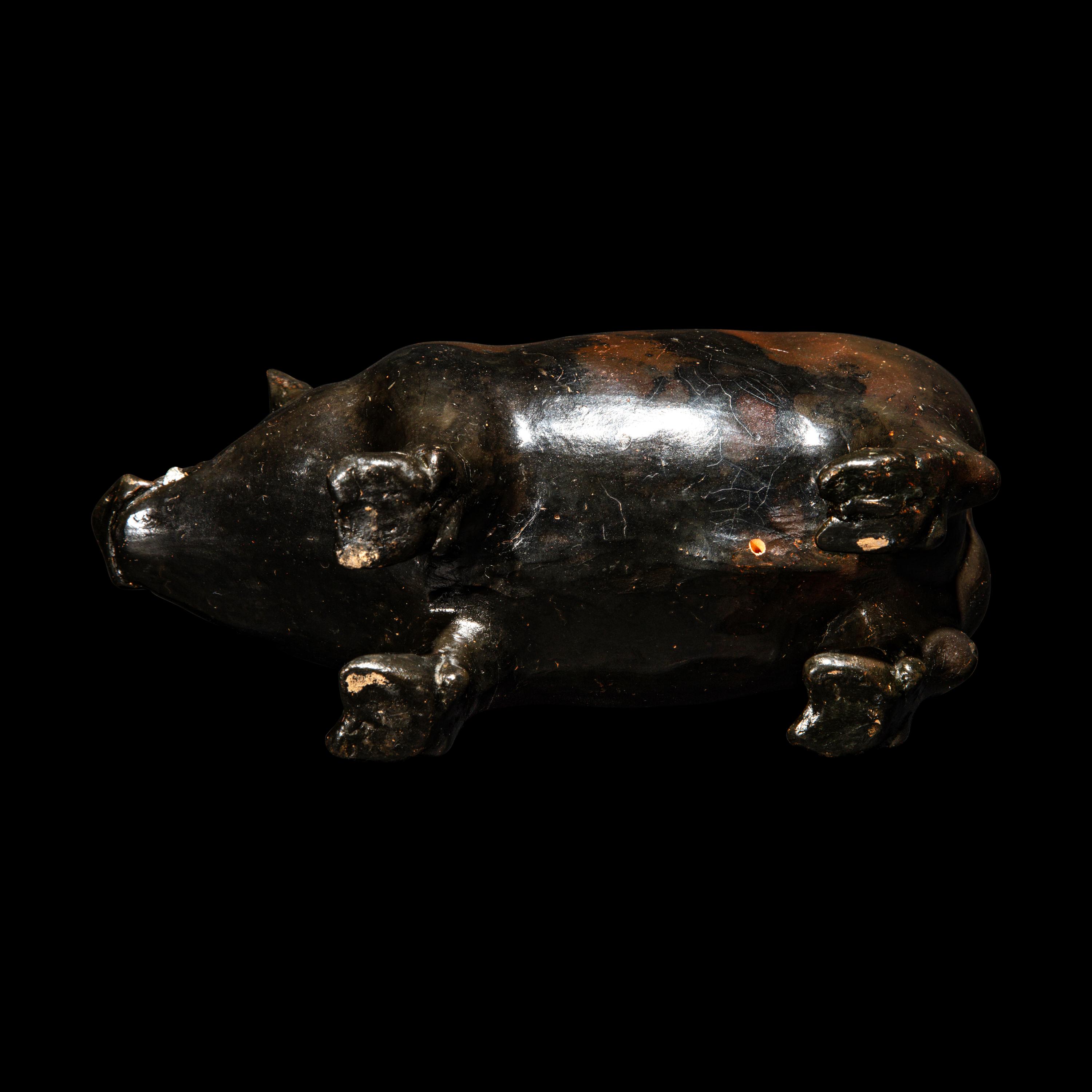 A South Italian Black-Glazed Askos in the form of a Boar