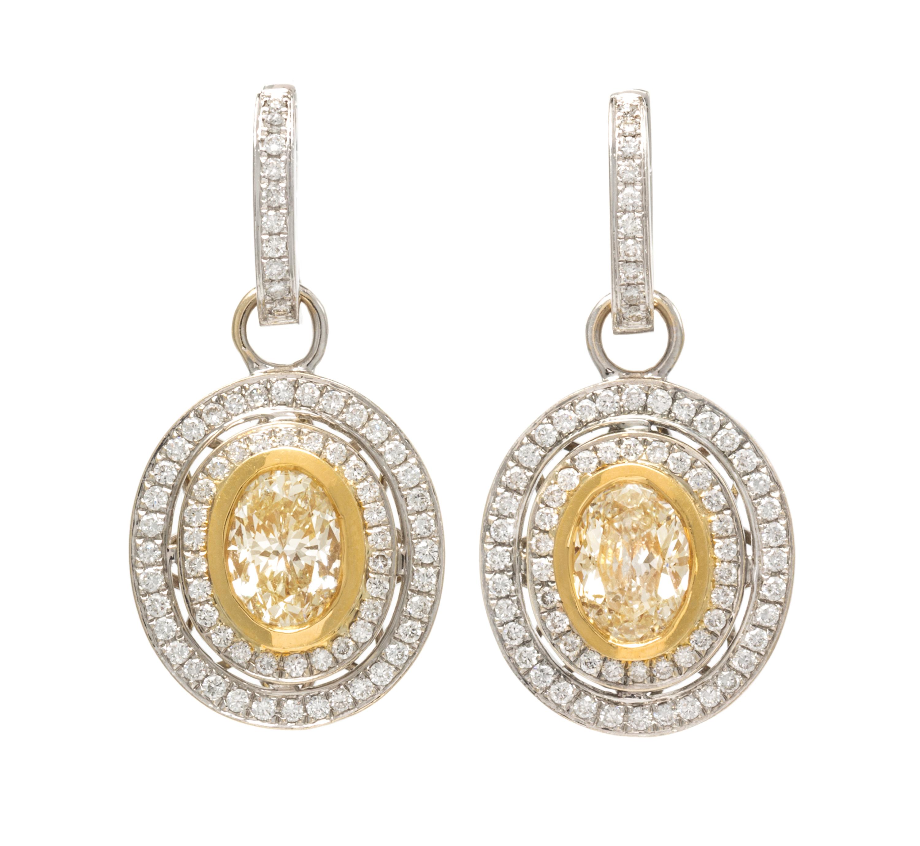 A Pair of 18 Karat Bicolor Gold, Colored Diamond and Diamond Earrings, 7.60 dwts.