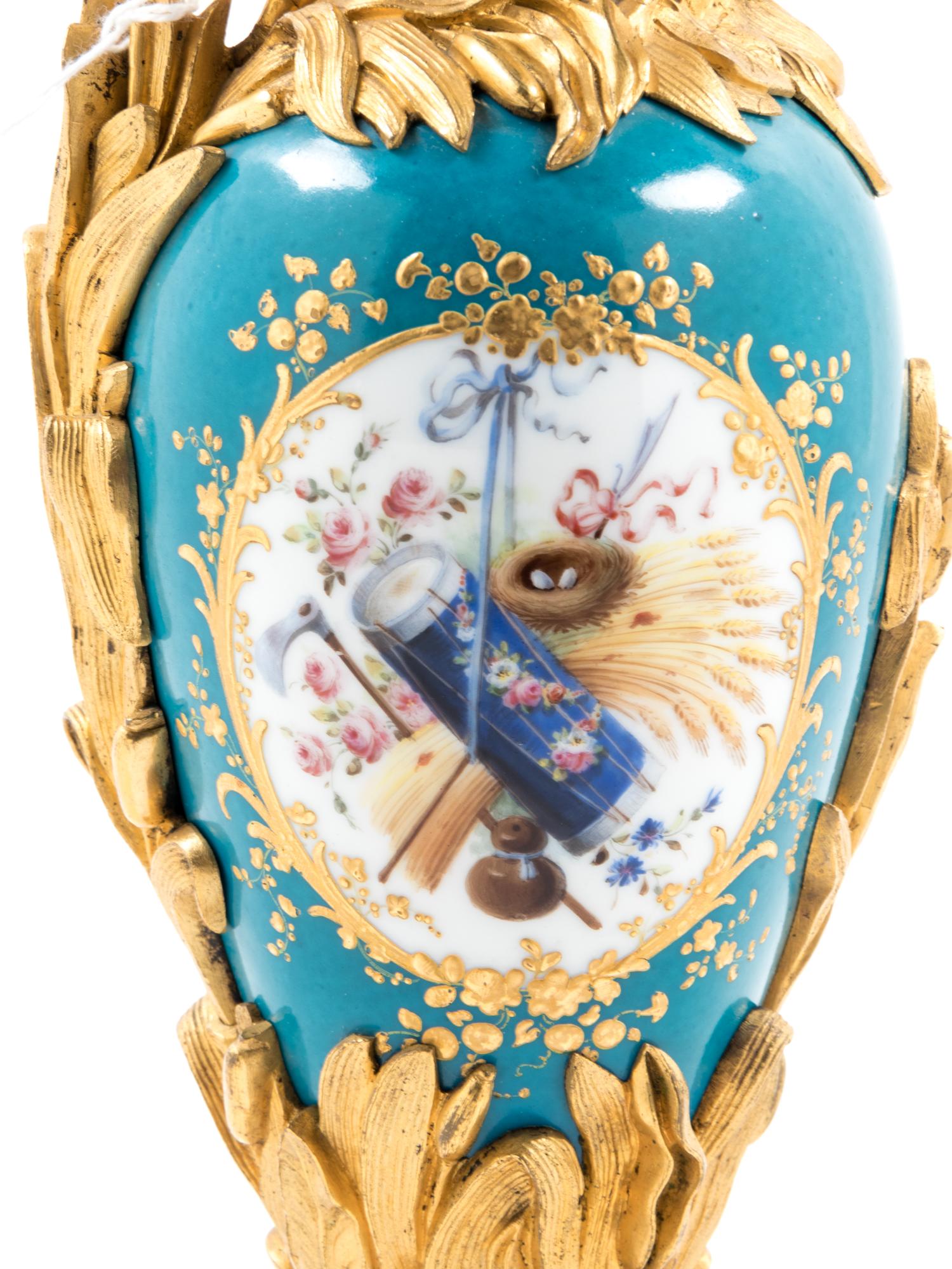 A Sèvres Style Gilt Bronze Mounted Porcelain Ewer