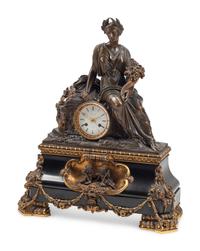 A French Bronze and Slate Figural Mantel Clock