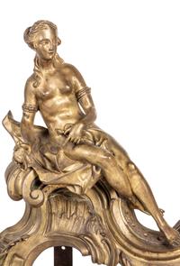 A Pair of Louis XV Gilt Bronze Figural Chenets