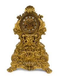 A Napoleon III Gilt Bronze Clock — LATE 19TH CENTURY