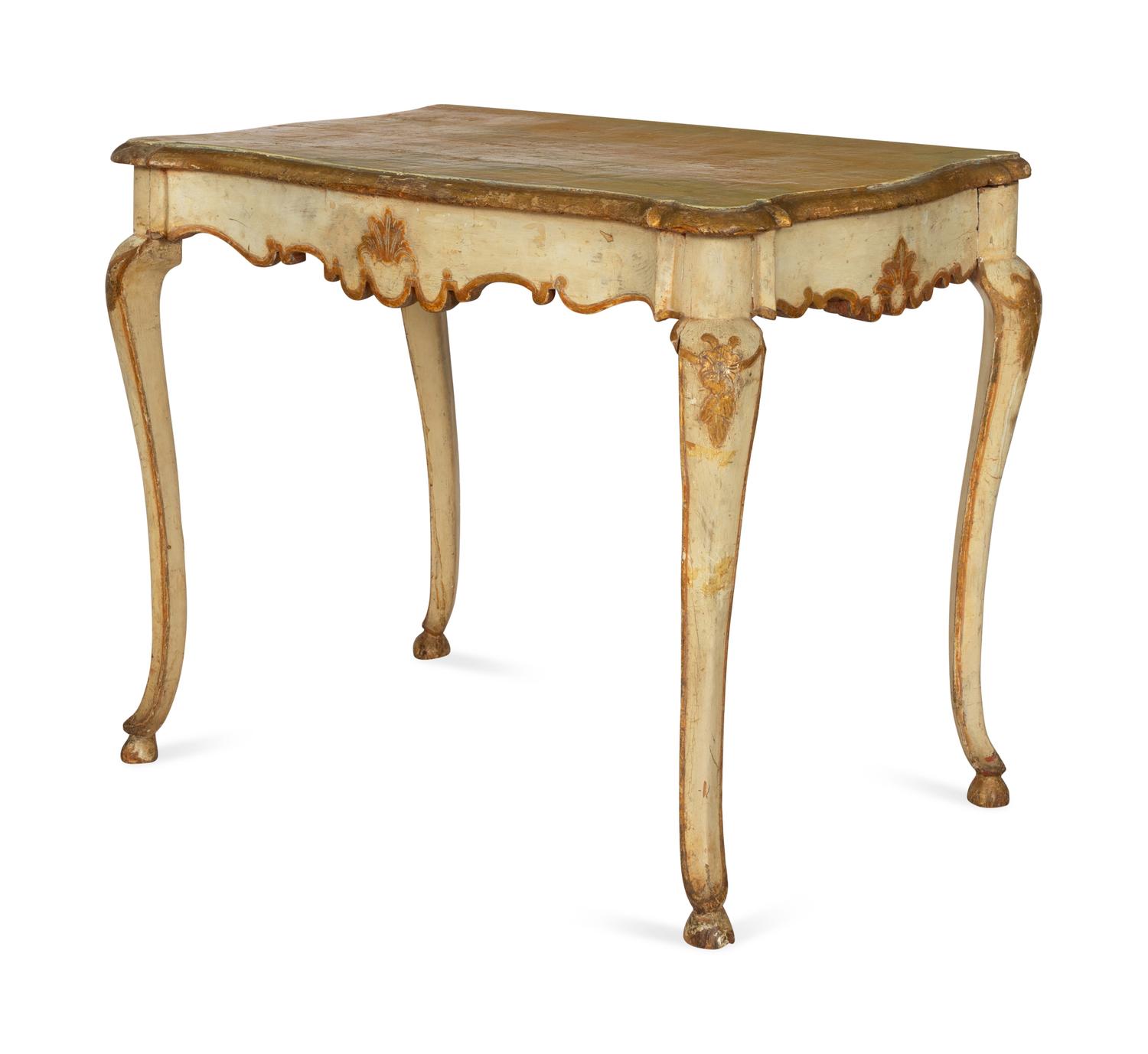 An Italian Rococo Cream-Painted and Parcel Gilt Console Table