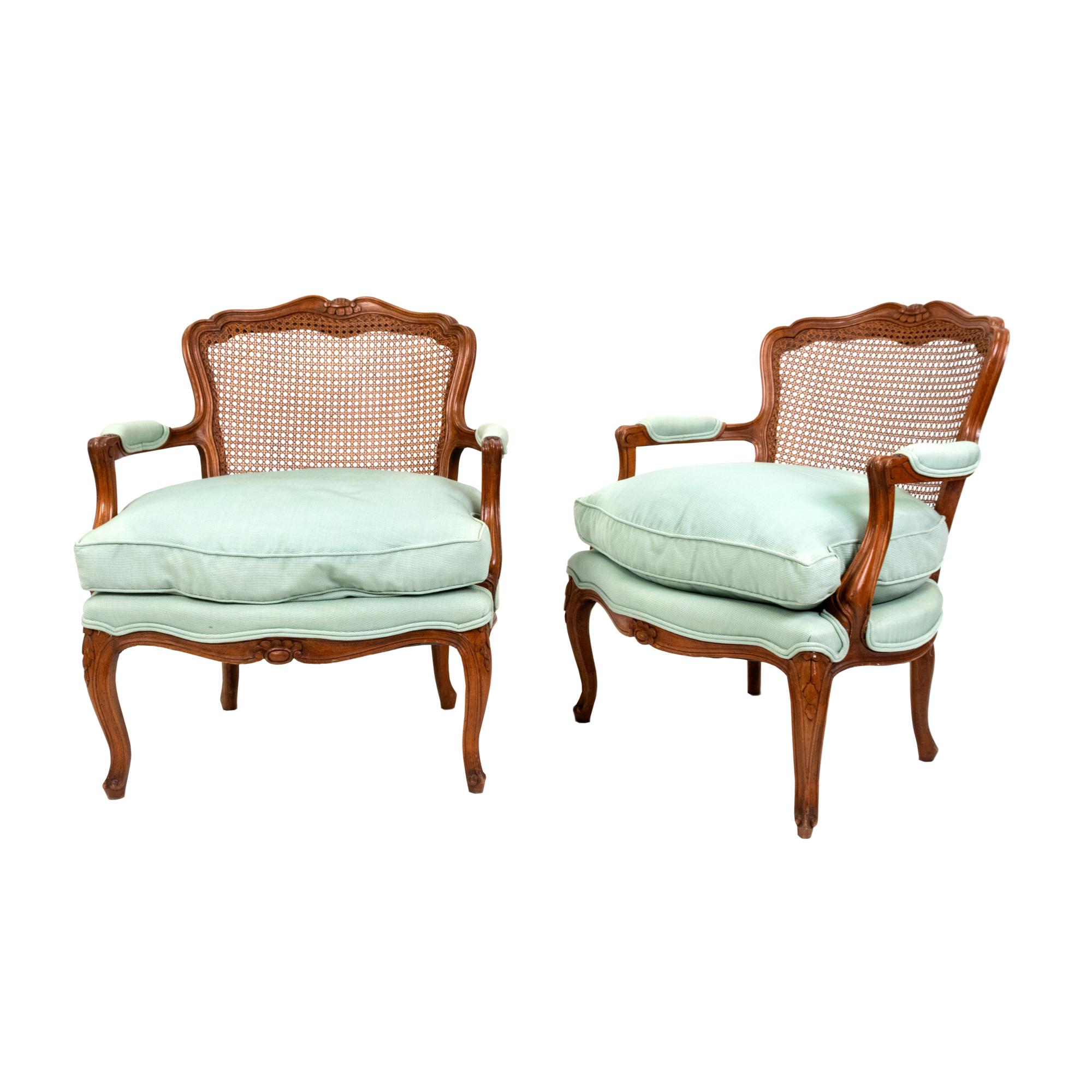 A Pair of French Provincial Louis XV Style Cane-Back Fauteuils — 20TH CENTURY