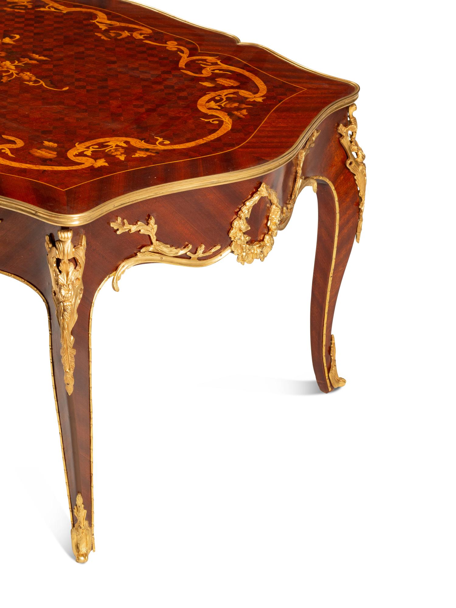 A Louis XV Style Gilt Bronze Mounted Marquetry Low Table