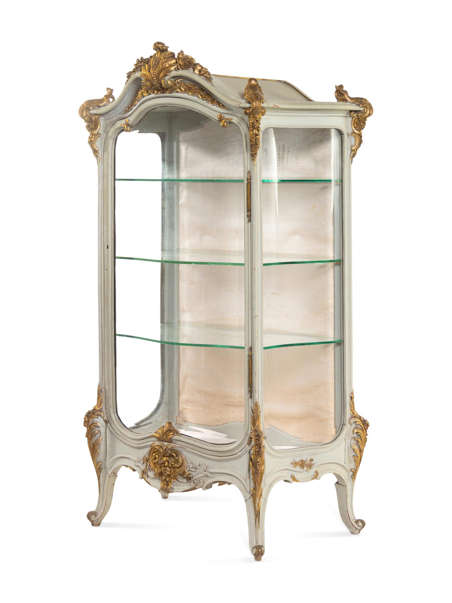 A Louis XV Style Painted and Parcel Gilt Carved Vitrine Cabinet