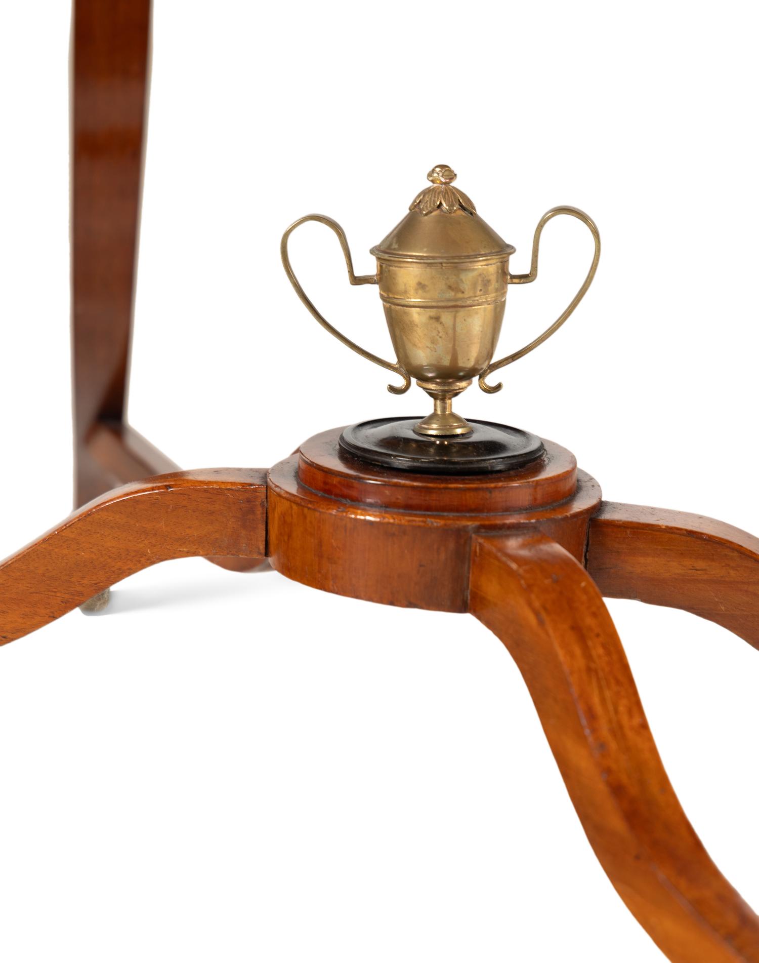 A Russian Neoclassical Part-Ebonized Bleached Mahogany Writing Table